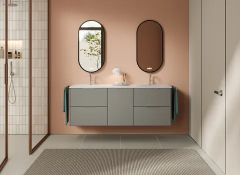 Waschtisch aus der Kollektion Oteo des Herstellers burgbad in der Farbe Kieselgrau softmatt mit zwei ovalen Spiegeln.